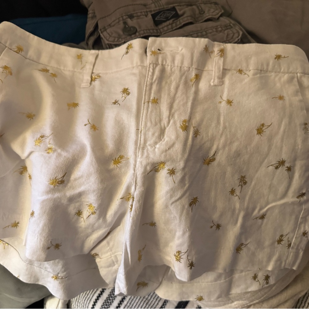 Old Navy white shorts with gold palm trees